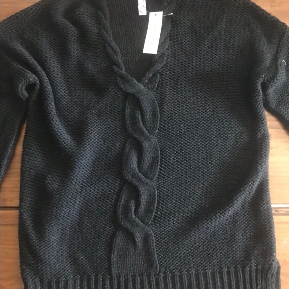 Francesca’s black sweater